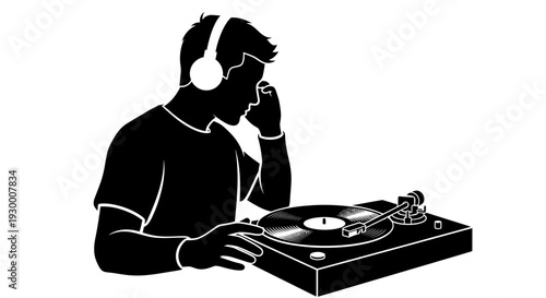 DJ spinning records on turntable with headphones on.