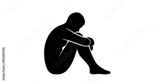 Silhouette of a person sitting in a contemplative or sorrowful pose.