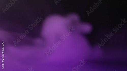 Abstract flowing purple smoke texture against a dark gradient background, ethereal and mysterious.