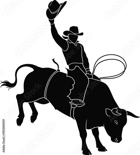 Silhouette of rodeo cowboy riding bucking bull and waving hat in air
