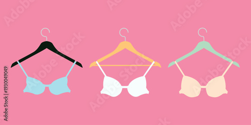 Trendy, colorful lingerie bras with small, medium, and large cups are displayed against a bright pink background, representing size diversity and style trends.