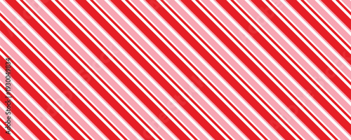 Candy cane Christmas background, peppermint diagonal stripes print seamless pattern