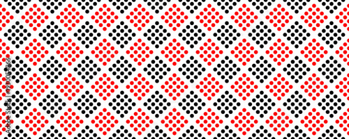Seamless pattern of red and black dots forming diamond shapes on a clean white background
