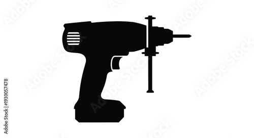 Black silhouette of a power drill with a drill bit isolated on white