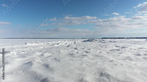 View from the ground, on the snow, showing the tracks
