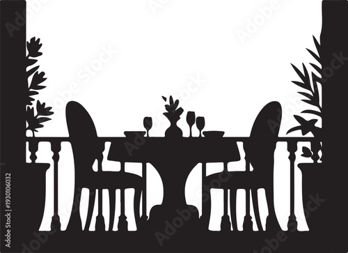 Black silhouette of dining table and chairs on balcony with plants