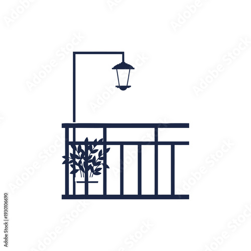 Balcony railing with street lamp and potted plant