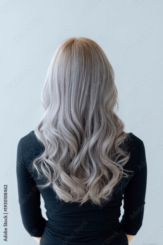 Naklejka premium Long Wavy Ash Blonde Hair Woman Back View