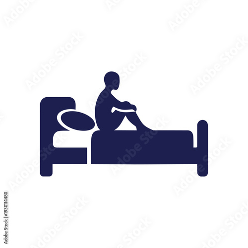 Person sitting on bed in bedroom silhouette