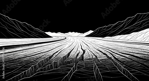 Dramatic black and white landscape showing a wide, deeply cracked valley with rugged mountain