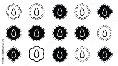 A collection of 12 ornamental prayer beads in black and white arranged in rows on a plain background
