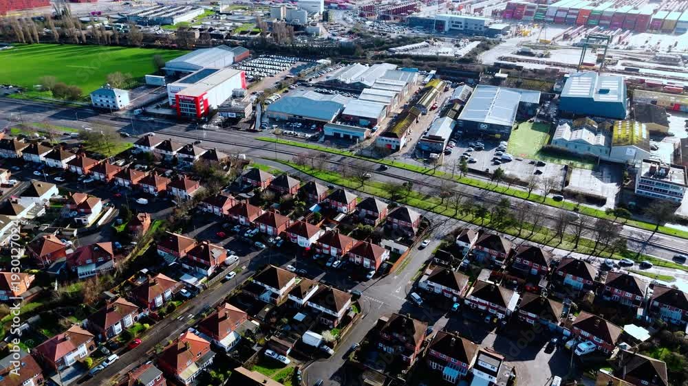 custom made wallpaper toronto digitalaerial drone shot high angle over the Millbrook suburban housing area estate in Southampton at sunset with trees, homes and nature surrounding. Shot in winter with traffic and cars driving the streets