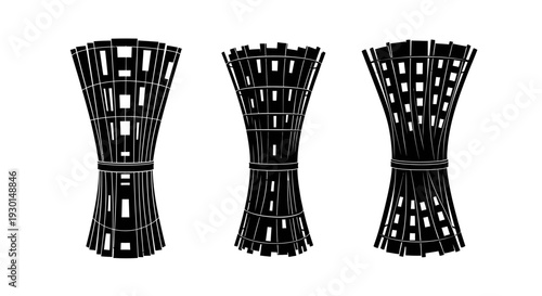 Three black woven bamboo or wooden decorative items on white background tied with thin cord