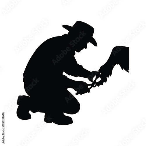 Cowboy trimming horse hoof silhouette