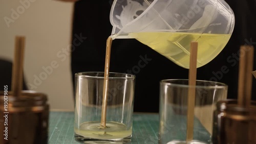 Creative hobby DIY candles at home. Candlemaker making aroma candle