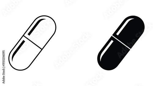 Black and white capsule pills on white background