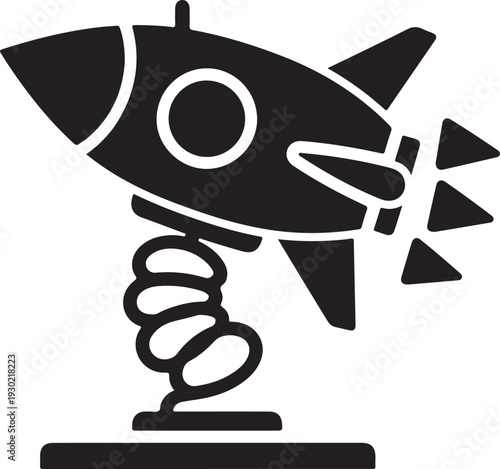 Black silhouette of a rocket ship on a spring ride, designed for children to bounce on at amusement parks or playgrounds