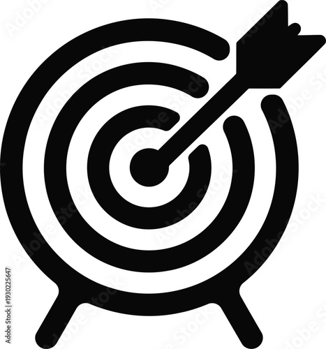 Archery target with arrow hitting bullseye for success and goal achievement