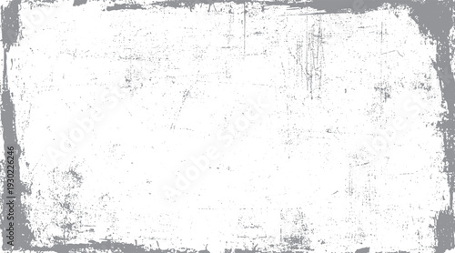 Gray distressed grunge border with scattered dots and scratches on a white background texture