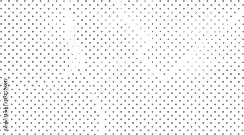 Gray polka dot pattern on white background. Scattered small circles and solid dots create a textured surface