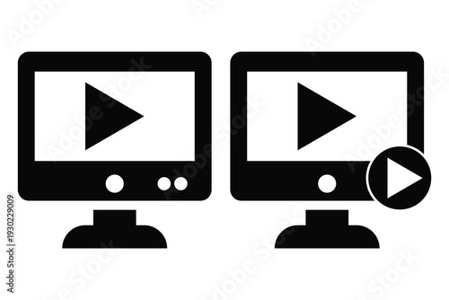 Two computer monitors displaying video play buttons on screen