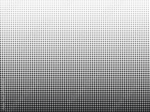 A regular arrangement of black circles progressively fades into smaller dots on a clear white surface
