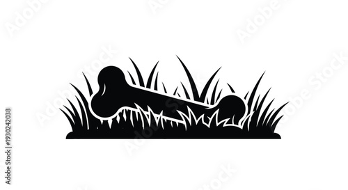 A black silhouette of a dachshund amongst blades of grass