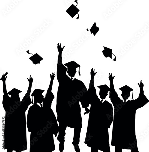 Graduates celebrating with tassel and cap toss in silhouette