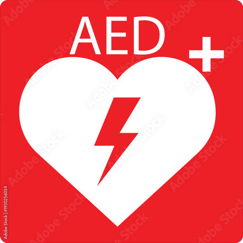 AED automated external defibrillator sign with white heart and red lightning bolt on red background