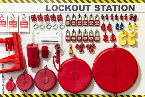 Lockout Tagout (LOTO) station with safety padlocks and warning tags for hazardous energy isolation before maintenance.
