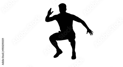 Silhouette of a person in a dynamic squatting position with arms raised