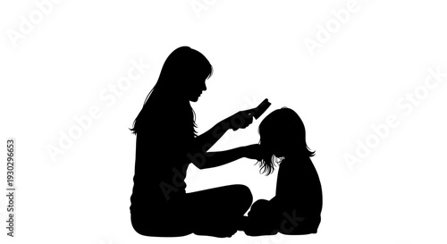 Woman combing little girl hair.