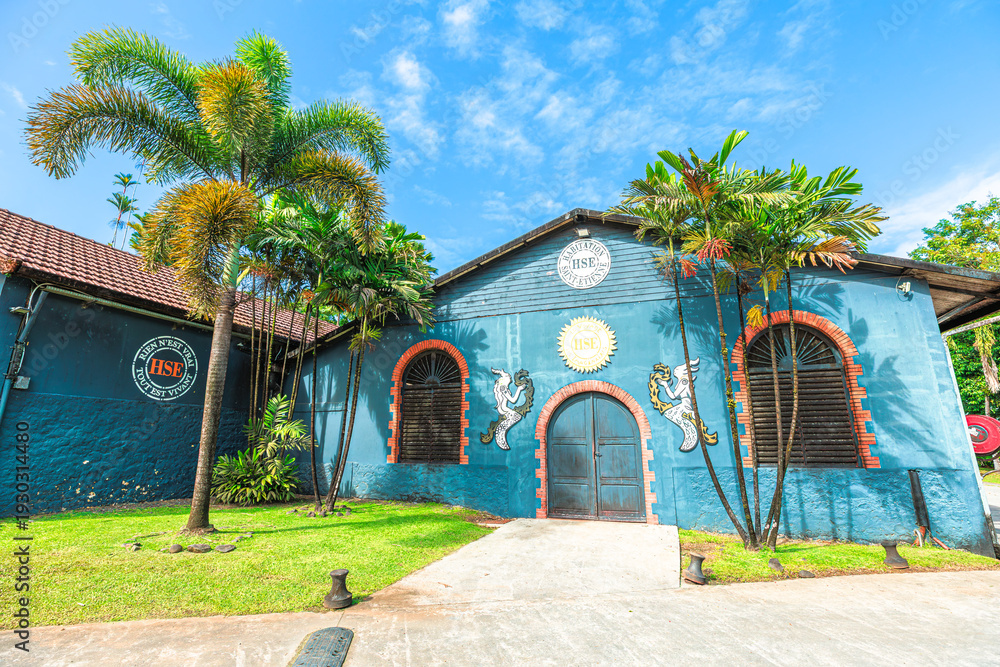Fototapeta premium Martinique, French Antilles - Dec 20, 2025: Habitation Saint-Etienne historic building and rum distillery in Martinique, French Antilles, making the famous Rhum Agricole