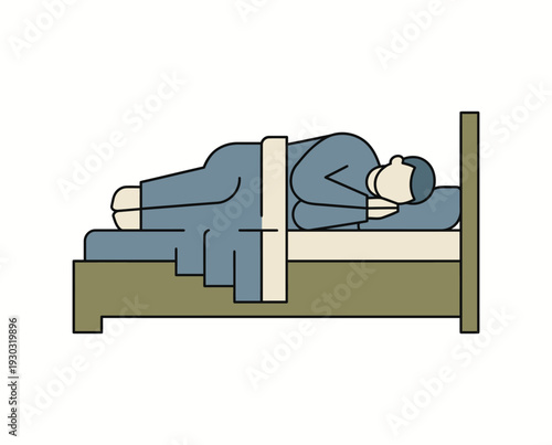 Person lying on bed with straitjacket restraint.