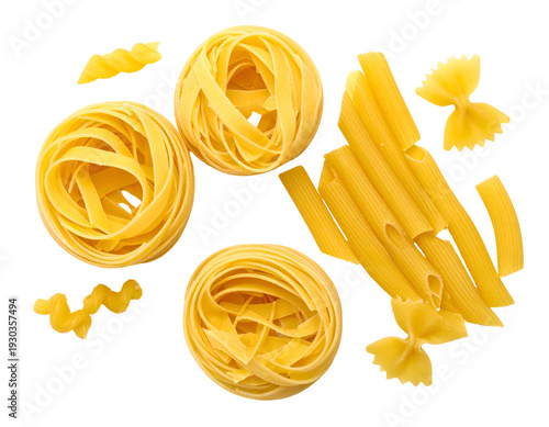 Assortment of golden, dry pasta shapes, including nests, tubes, and bows