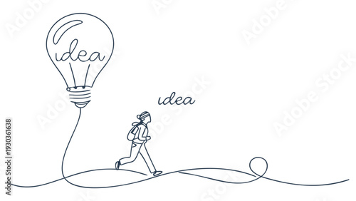 Businessman walking towards a bright idea with lightbulb