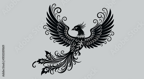 Ornate black phoenix illustration with decorative wings and tail.