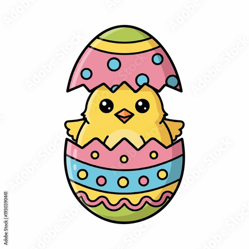 Adorable yellow chick hatching from a brightly decorated, colorful Easter egg shell with polka dots and stripes for springtime celebration.