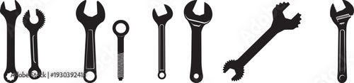 High-Resolution Collection of Black Wrenches and Tools, Featuring Adjustable, Open-End, and Ring Spanners Ideal for Mechanical Work, Repair and Construction Projects