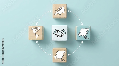 Wallpaper Mural Wooden blocks illustrating global partnership and international business exchange with a central handshake symbol on a light blue background. Torontodigital.ca