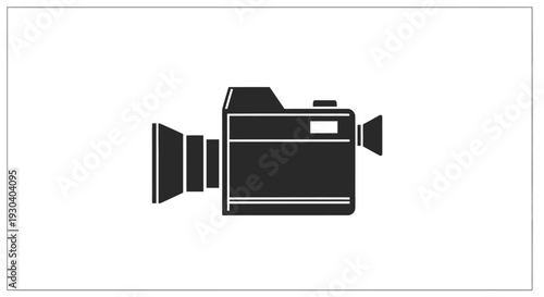 Black video camera with lens.