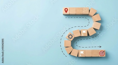 Wallpaper Mural Wooden blocks with icons trace a winding path marked by dashed lines, representing a complex journey or project roadmap toward a final destination. Torontodigital.ca