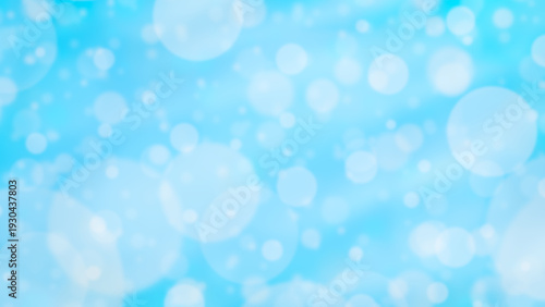 Light blue background with soft white bokeh lights and defocused circles in different sizes. Clean abstract layout with an airy feel suitable for winter, celebration, and festive designs