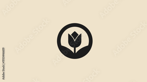 Black tulip inside a circle on a cream background, representing growth and nature