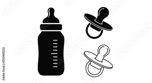 Baby items including bottle and pacifiers in dark silhouette