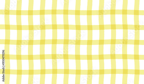 A yellow and white checkered tablecloth or fabric