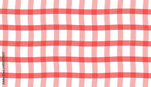 A red and white checkered tablecloth on a white background