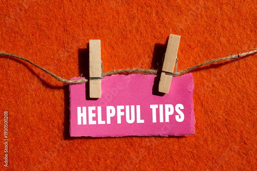 Canvas Print Helpful tips message written on ripped torn paper background