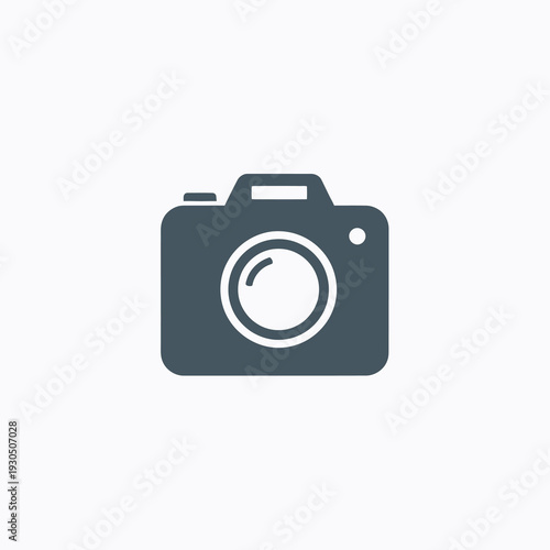 Minimalist Digital Photo Camera Icon for Photography Studio on White Background Vector Logo Design.