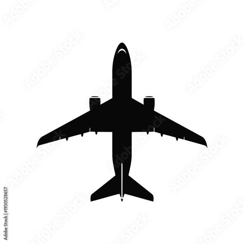 A commercial airliner flying high in the clear blue sky viewed from directly below the aircraft silhouette